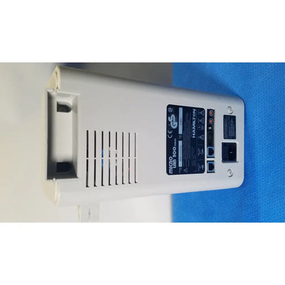 White plastic hamilton microlab 500 series diluter dispenser smart device with label, ethernet ports, and ventilation slits