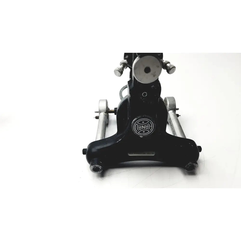Black metal hanau semi-adjustable dental modular with chrome articulator and silver accents featuring b&h logo