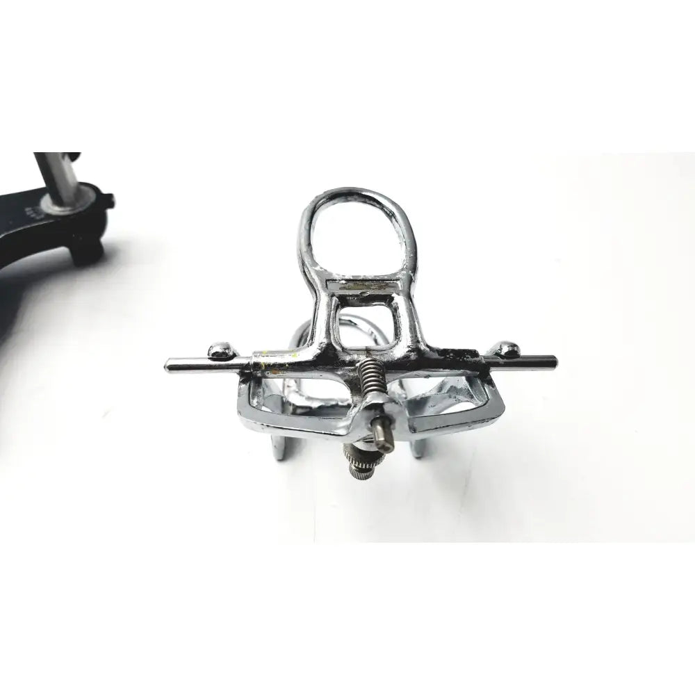 Hanau semi-adjustable dental modular chrome articulator with chrome finish u-shaped handle and adjustable screw mechanism