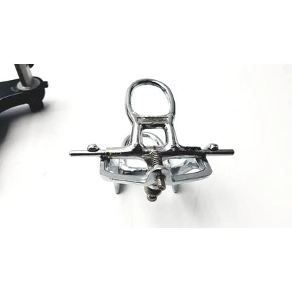 Hanau semi-adjustable dental modular chrome articulator with chrome finish u-shaped handle and adjustable screw mechanism