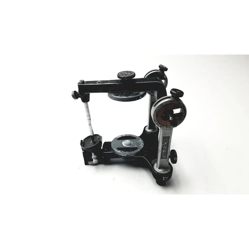 Hanau semi-adjustable dental modular with black and silver chrome articulator featuring adjustable arms and knobs