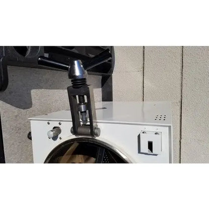 Black metal pipe wrench mounted on white harvey sterilemax st75935 appliance for reuse medical applications