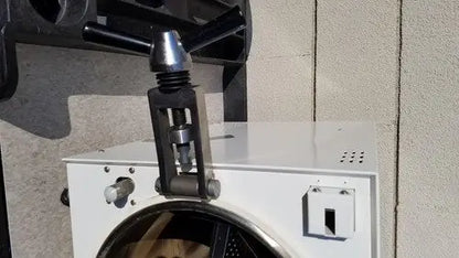 Black metal pipe wrench mounted on white harvey sterilemax st75935 appliance for reuse medical applications