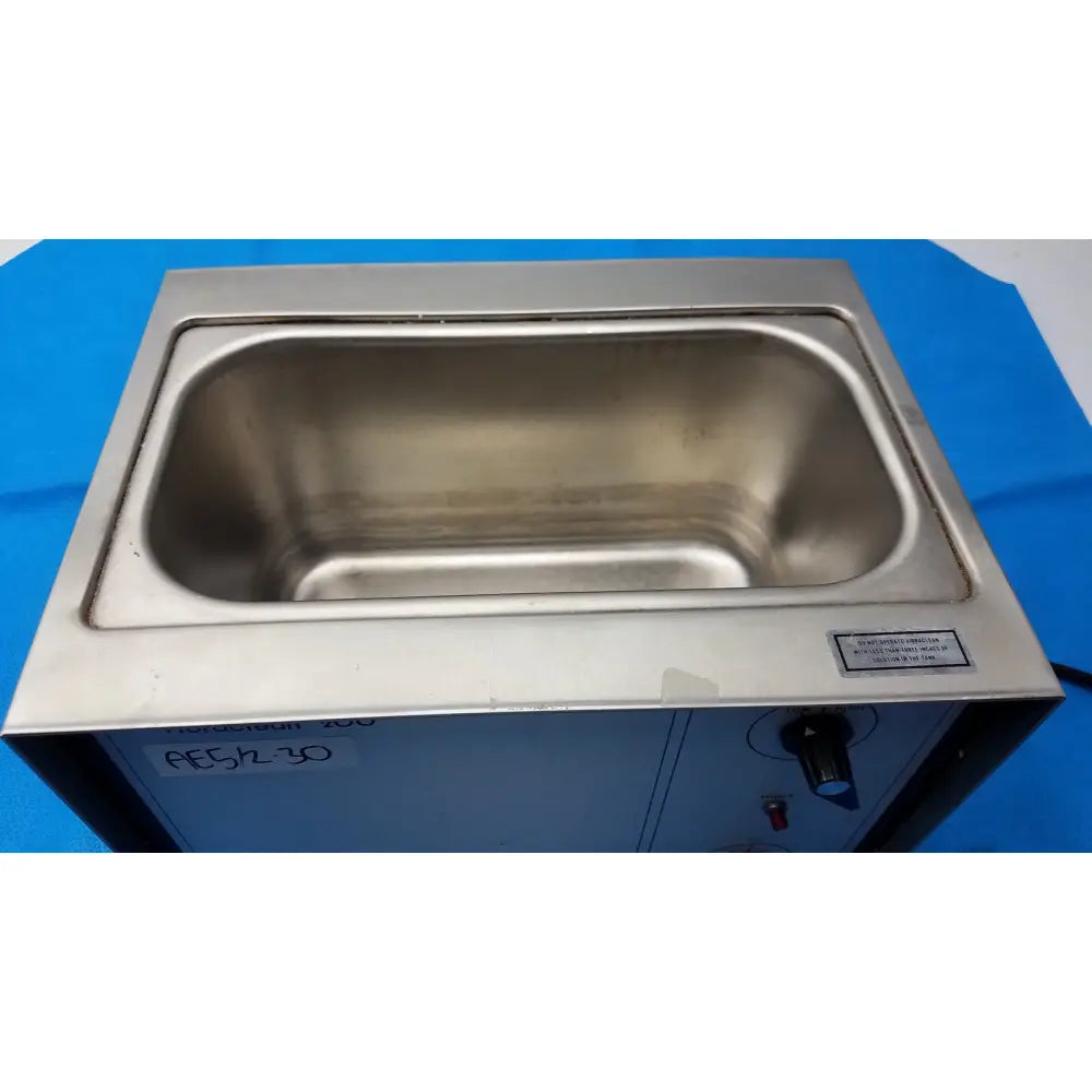 Stainless steel ultrasonic cleaner harvey vibraclean model 200 with rectangular tank and control panel in silver