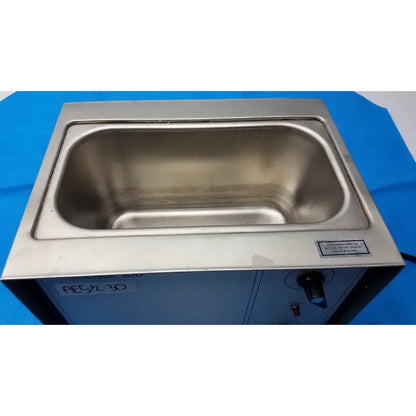 Stainless steel ultrasonic cleaner harvey vibraclean model 200 with rectangular tank and control panel in silver