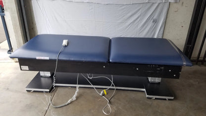 Reuse Medical Equipment Hausmann Bariatric Dual-Lift Electric Hi-Lo Treatment Table Powered Examination Tables, second-hand product photo 1