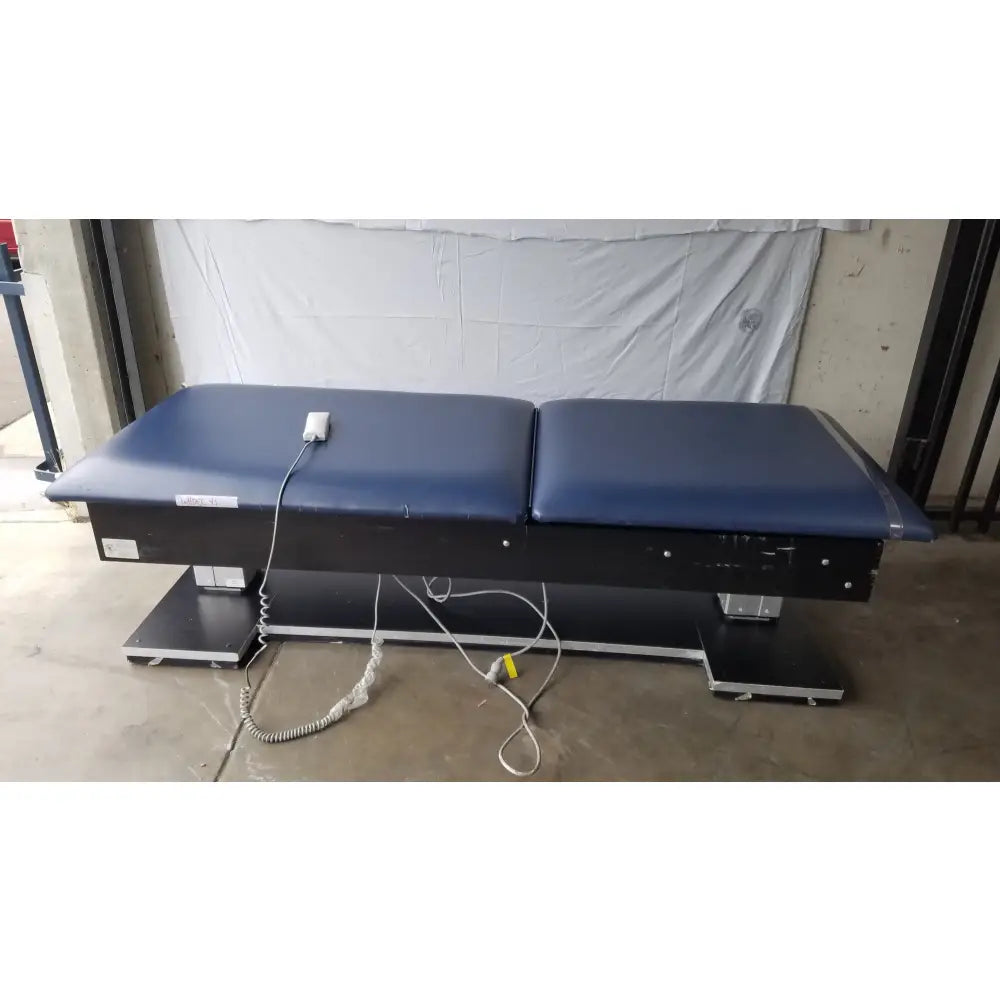 Reuse Medical Equipment Hausmann Bariatric Dual-Lift Electric Hi-Lo Treatment Table Powered Examination Tables, second-hand product photo 1