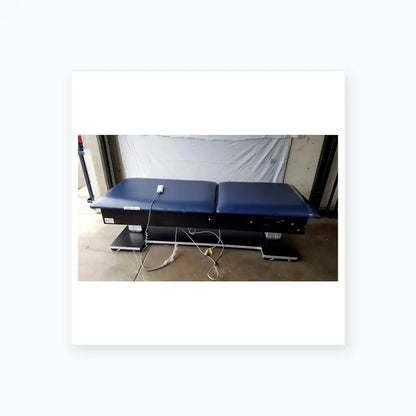 Reuse Medical Equipment Hausmann Bariatric Dual-Lift Electric Hi-Lo Treatment Table Powered Examination Tables, second-hand product photo 1