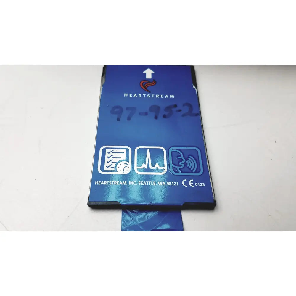 Blue heartstream eo1 semi automatic defibrillator battery with white icons for reliable emergency use
