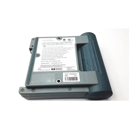 Gray plastic hewlett packard heartstream eo1 semi automatic defibrillator with textured grip and model number label