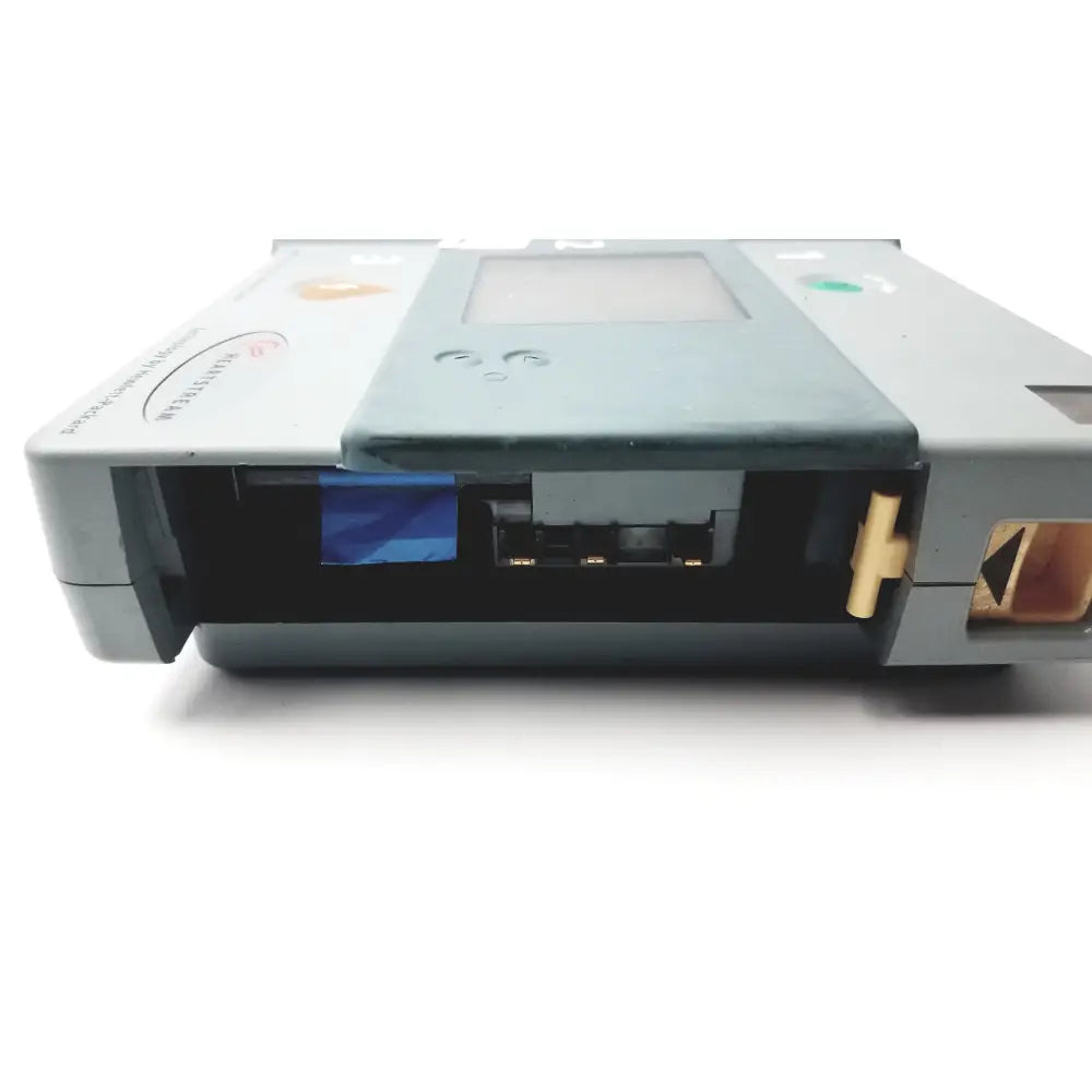 Gray and teal heartstream eo1 semi automatic defibrillator with digital screen labeled aed for emergency use
