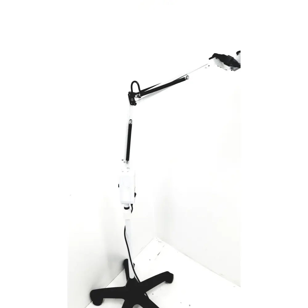 Adjustable white and black heat tdp lamp infrared tall with articulated arm and swivel rolling stand tested and working