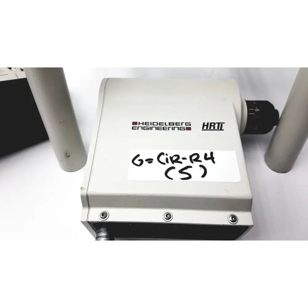 Gray metallic heidelberg engineering hrti laser head model lsc210 box with handwritten g-cir-r4 s label visible