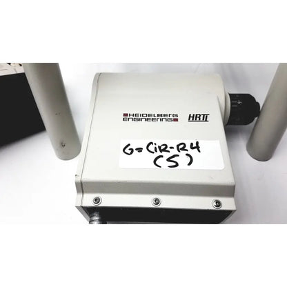 Gray metallic heidelberg engineering hrti laser head model lsc210 box with handwritten g-cir-r4 s label visible