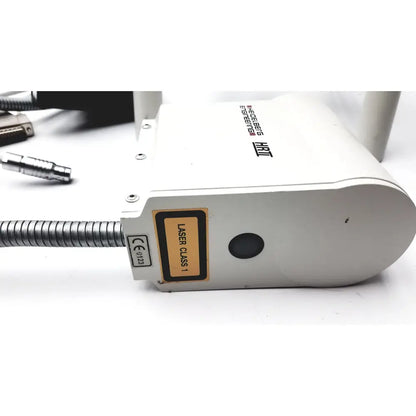 White metallic engineering hrti laser head with coiled metal cable and laser class 1 label for heidelberg engineering hrti