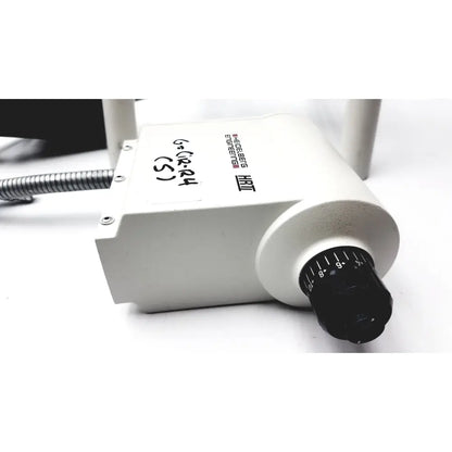 White rectangular medical device heidelberg engineering hrti laser head model lsc210 with black dial and silver tubing attached