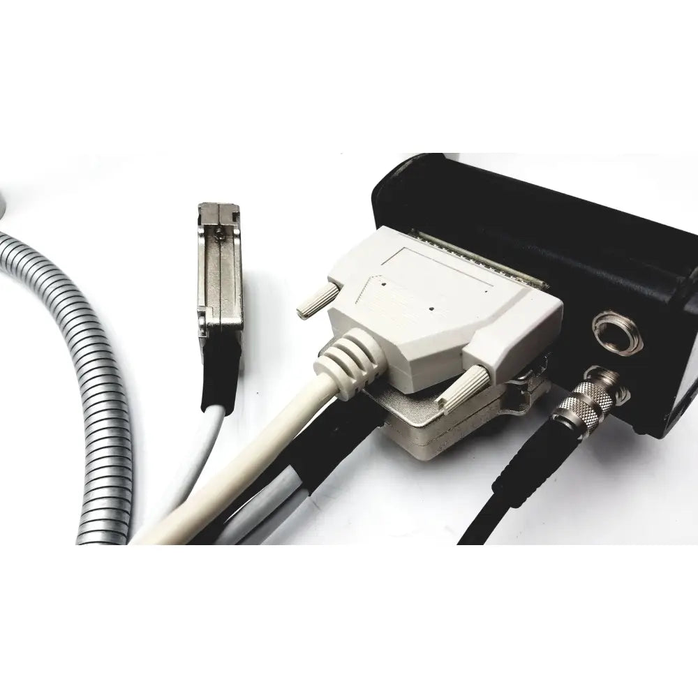 White d-sub 25-pin connector with metallic pins and ribbed cable attached to the back of heidelberg engineering hrti laser head