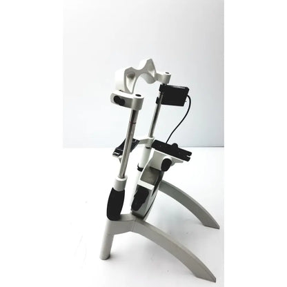 White and black adjustable bicycle stand with metallic poles and ergonomic grips for heidelberg engineering hrti laser head accessories