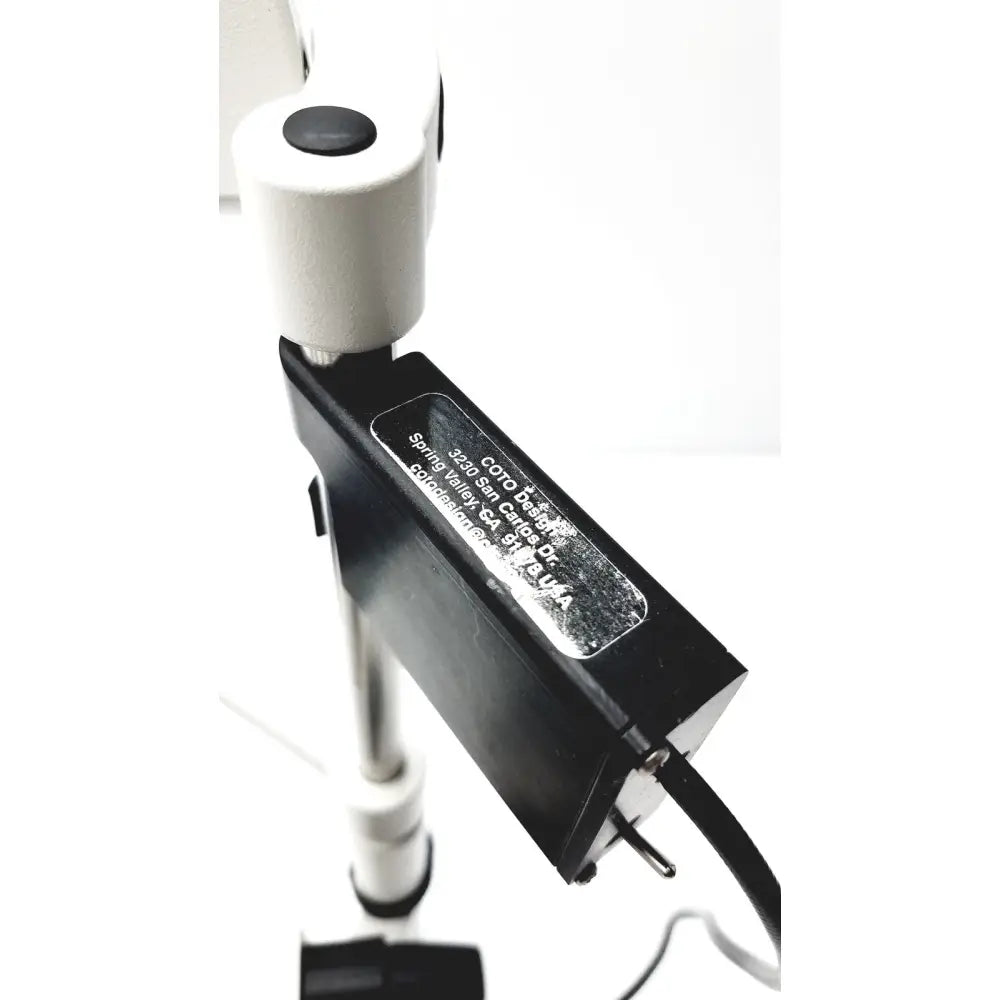 Black rectangular Heidelberg Engineering HRTI laser head model LSC210 with silver label and white mounting arm accessory