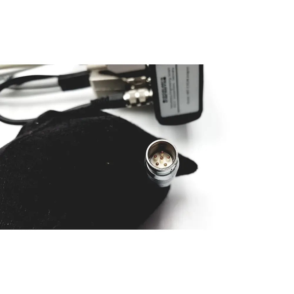 Silver metallic connector with six gold pins on the back side of heidelberg engineering hrti laser head model lsc210 accessory
