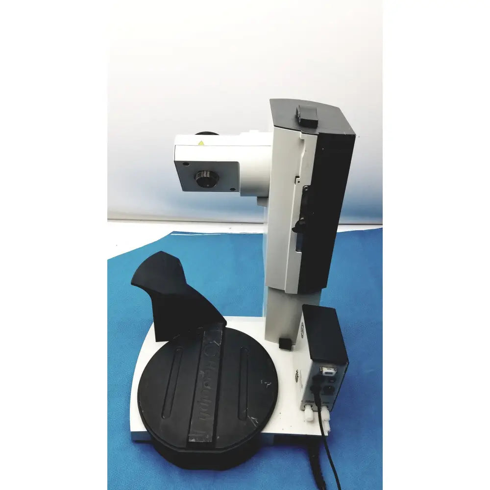 Black and silver heidolph basis hei-vap rotary evaporator with circular stage mounted on a sturdy base for laboratory use