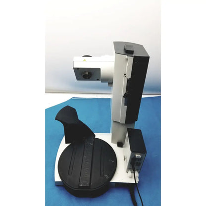 Black and silver heidolph basis hei-vap rotary evaporator with circular stage mounted on a sturdy base for laboratory use