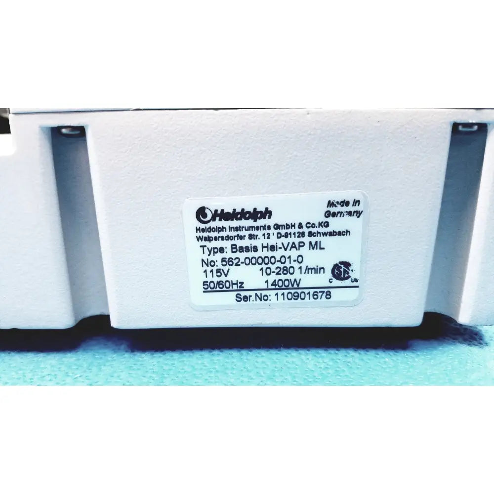 White plastic industrial vacuum pump of the heidolph basis hei-vap ml rotary evaporator with black heidolph label