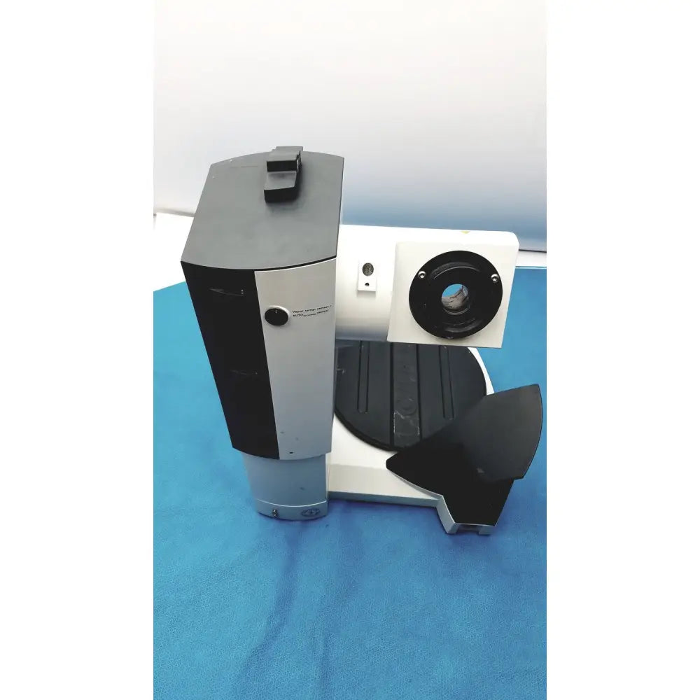 Black and silver heidolph basis hei-vap rotary evaporator with circular lens port on right side for laboratory use