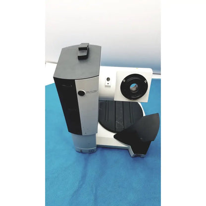 Black and silver heidolph basis hei-vap rotary evaporator with circular lens port on right side for laboratory use