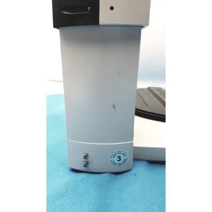White rectangular heidolph basis hei-vap ml rotary evaporator with black top and 3 year warranty sticker