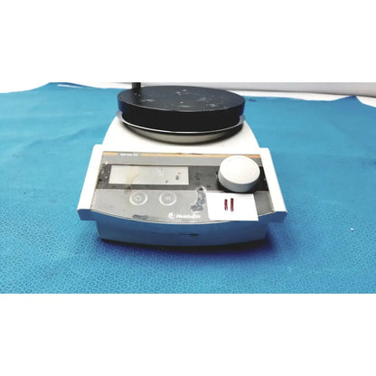 Used heidolph mr hei-tec magnetic stirrer hotplates with black stirring plate and white control panel showing wear