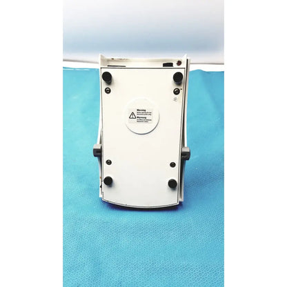 White plastic heidolph mr hei-tec magnetic stirrer hotplates with black rubber feet and circular warning label for pt1000 sensor