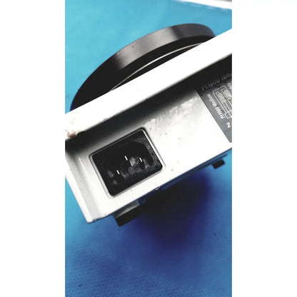 White plastic power adapter with black plug and circular component for heidolph magnetic stirrer hotplates pt1000