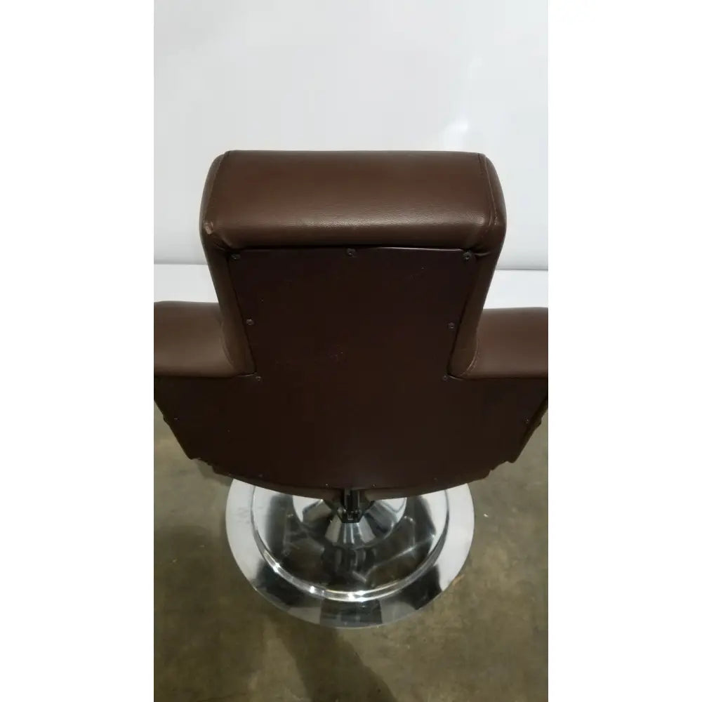 Height adjustable phlebotomy chair reg ca 31278 with brown leather upholstery and chrome base for clinical use