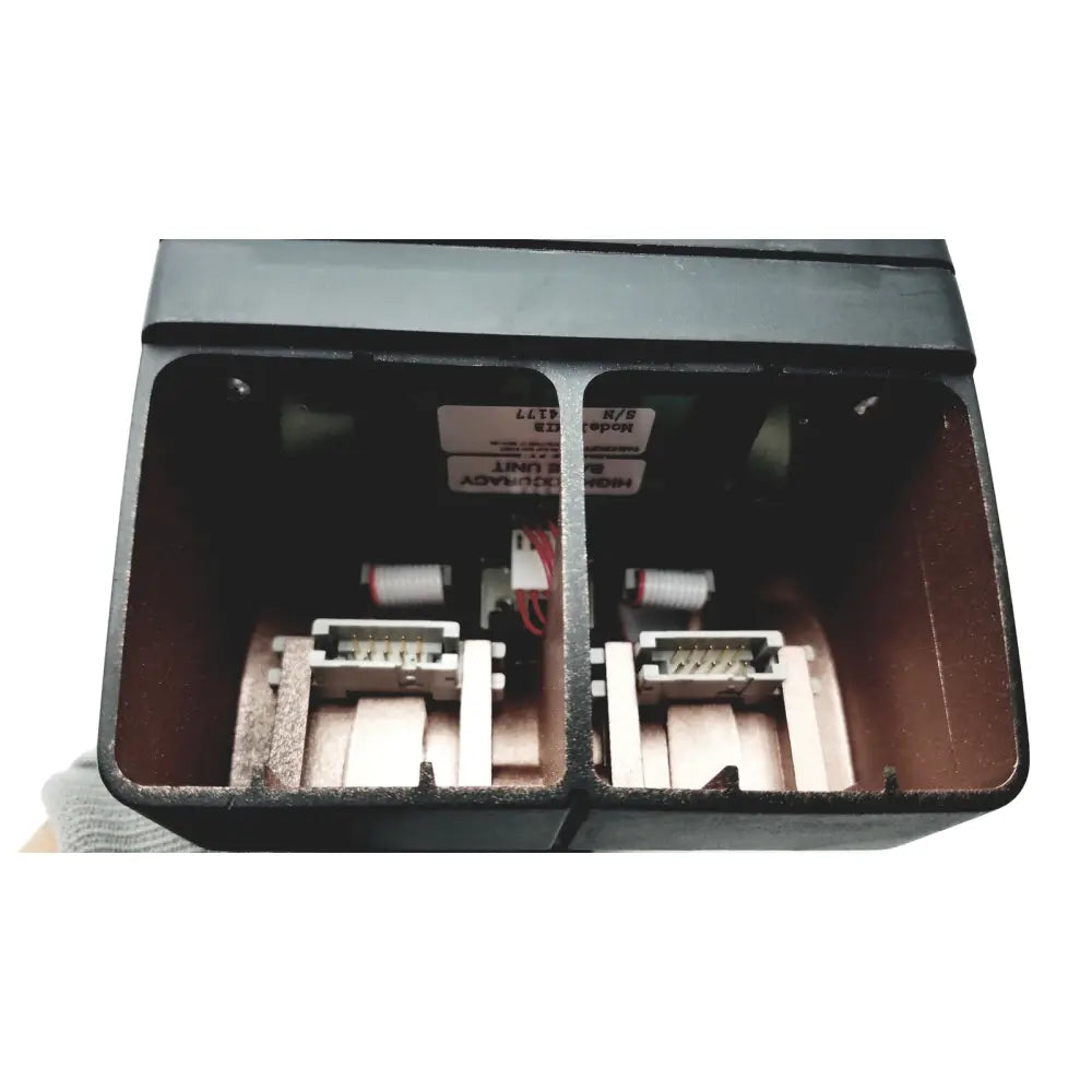 Black plastic housing with two white and red electrical connectors on the back of heise hand held calibrator 6d49 e171189