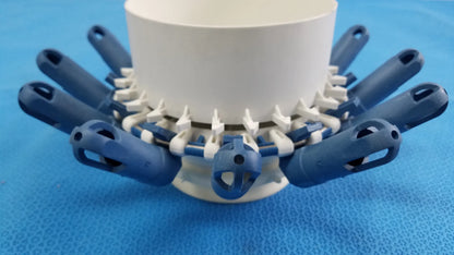 Blue and white plastic clothes drying rack with multiple arms shown alongside helmer centrifuge rotor with tube inserts