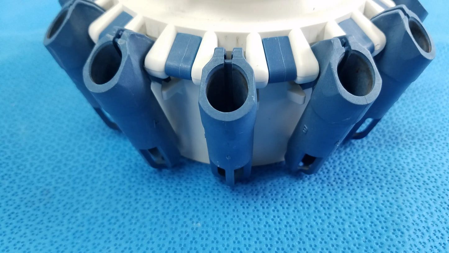Blue and white plastic centrifuge rotor connector assembly with cylindrical tube inserts compatible with helmer centrifuge