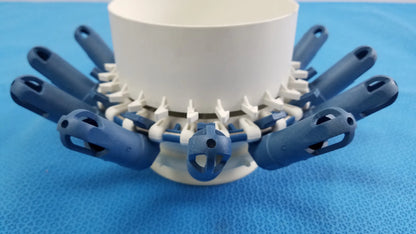 Blue and white plastic centrifuge rotor with tube inserts compatible with helmer centrifuge 3500 rpm 12x30g sample holders