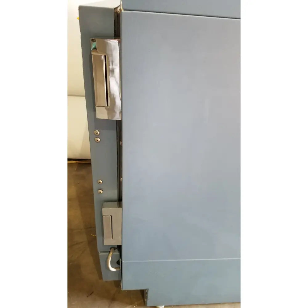 Gray industrial-grade safe with metallic latch and keyhole in helmer hlf105 horizon series laboratory freezer