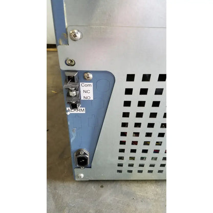 Blue industrial control panel with perforated metal grille and labeled ports on the back of helmer hlf105 horizon series laboratory freezer