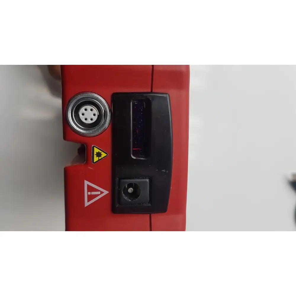 Red industrial laser scanner of hemoCue Hb 201 DM hemoglobin system analyzer with black display and circular port for reuse medical