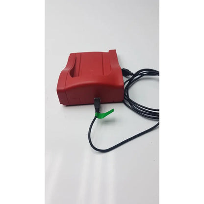 Red plastic nintendo game boy advance sp with black usb cable attached for reuse medical hemoCue hb 201 dm analyzer use