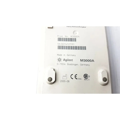 White Hewlett Packard Speed Point technology m3000a electronic test instrument with matte finish and printed serial label
