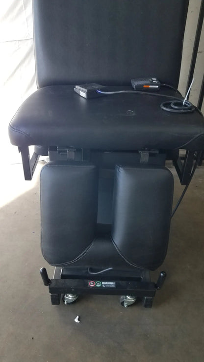 Black padded hill ha90pt mobilization physical therapy treatment table with adjustable footrests and caster wheels