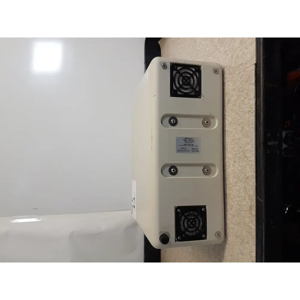 Beige rectangular wall-mounted air conditioning unit with black ventilation grilles and silver screws for hill rom excel care bariatric therapy system