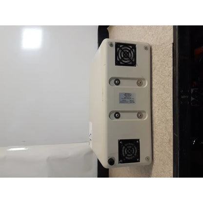 Beige rectangular wall-mounted air conditioning unit with black ventilation grilles and silver screws for hill rom excel care bariatric therapy system
