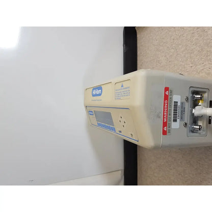 Beige hill rom excel care bariatric therapy system bed control panel with digital display and button interface