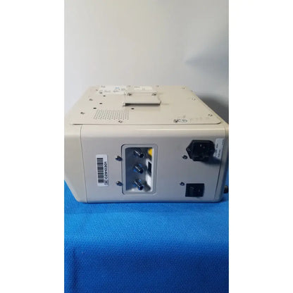 Beige medical imaging device with multiple ports and power input on rear panel of Hill-Rom p7810 compella bariatric therapy system