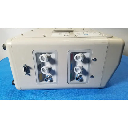 Beige industrial-grade hill-rom p7810 compella bariatric therapy system rear panel with white and metallic connectors