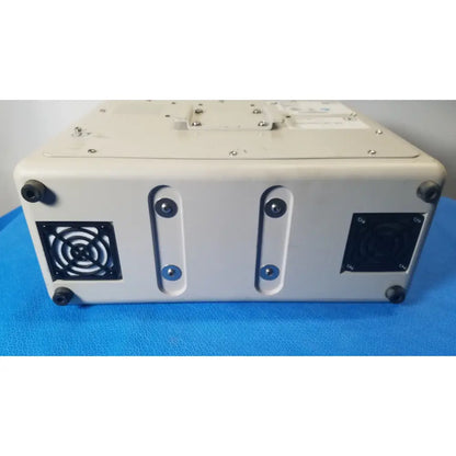 Beige industrial-grade p7810 compella bariatric electronic device with black ventilation grilles and rubber feet rear view